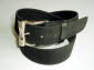 Black suede belt with silver colour buckle.